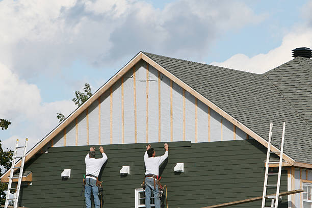 Professional Emergency Siding Repair technician working in Addison, IL
